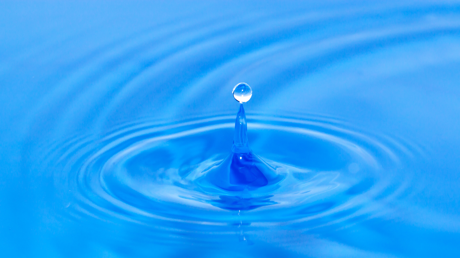 Water splashing and creating ripples.